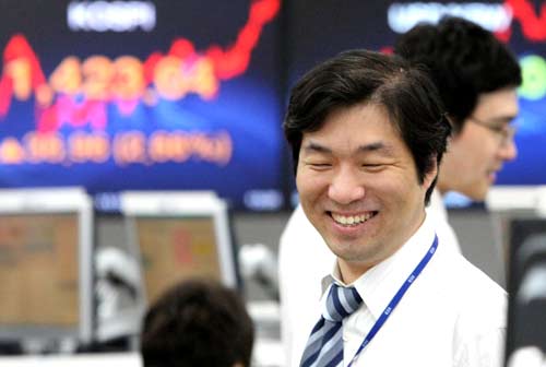 Japan shares up on weaker yen