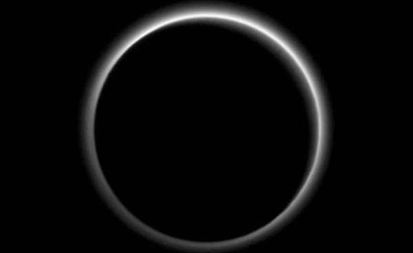 Flowing ice, haze on Pluto