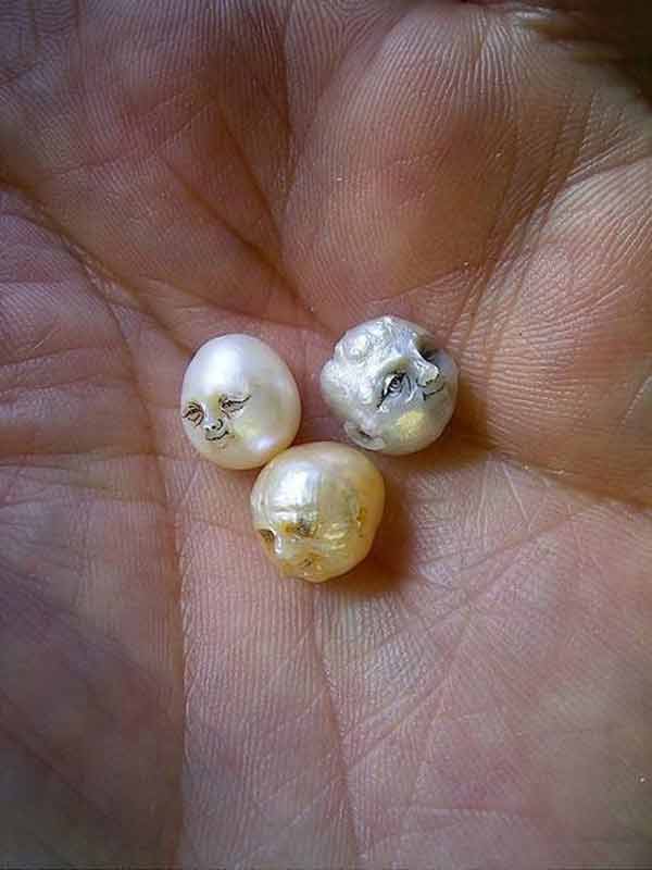 Artist carves faces, skulls out of pearls