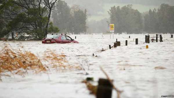 Rising floodwaters force evacuations in Australia