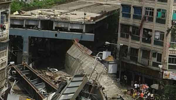 3 dead in India flyover collapse; buses, taxis trapped