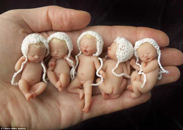 Artist creates miniature lifelike infants with the most adorable features