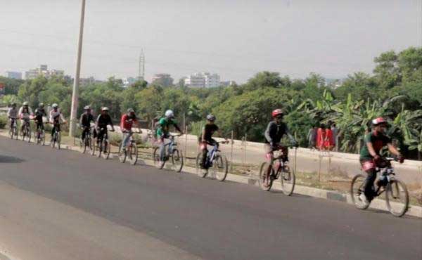 Cyclists in Bangladesh form world’s longest line of moving bikes