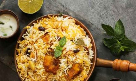 Shahi Biryani with layers of saffron rice and creamy mutton