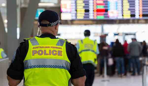Australia tightens checks on airport staff